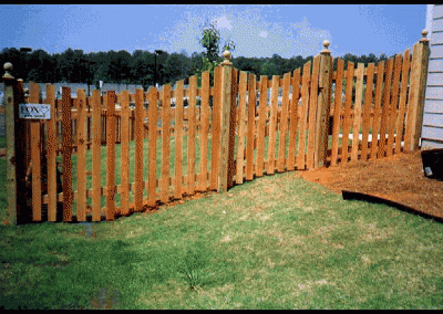 The picture of wooden fencing on the ground against the blue sky