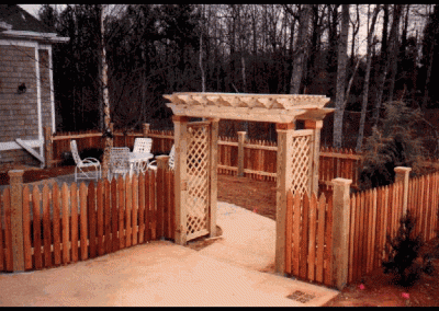 Wooden fencing with decorative square alter