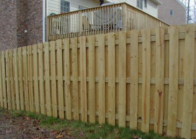 Panel wood fencing around a residential house