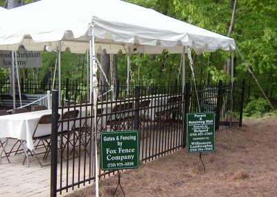 A metal fencing around a sitting arrangement